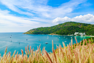 Scenic view of sea against cloudy sky
