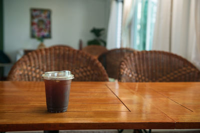 Close-up of drink on table at home