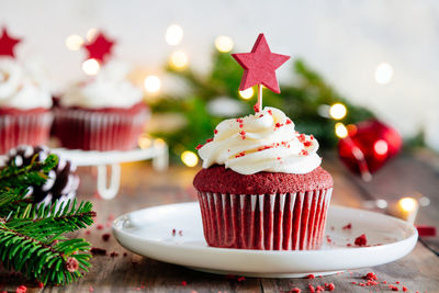 Close-up of cupcakes on christmas tree