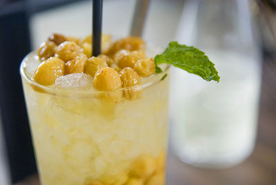 Close-up of drink on glass table