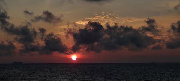 Scenic view of sea against sky during sunset