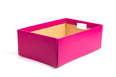 High angle view of pink umbrella against white background