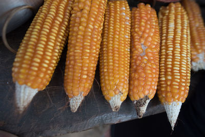 High angle view of vegetables for sale at market stall corn