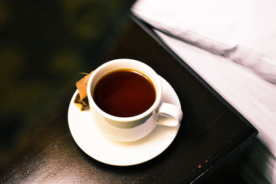 High angle view of coffee cup on table