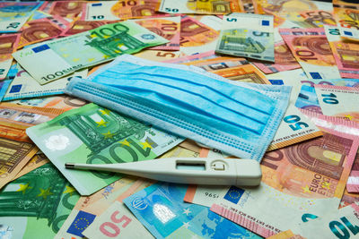 High angle view of various coins