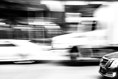 Blurred motion of car on street in city