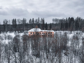 Scenic view of lake against sky during winter