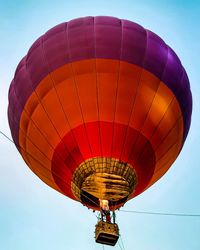 Low angle view of hot air balloon against sky
