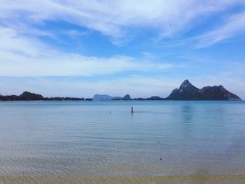 Scenic view of sea against blue sky