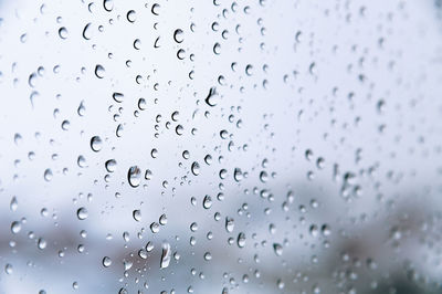 Rain drops on window glasses texture background