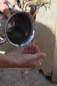 Close-up of man holding camera