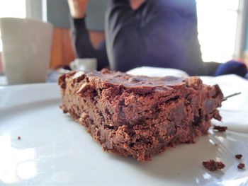 Close-up of serving chocolate cake