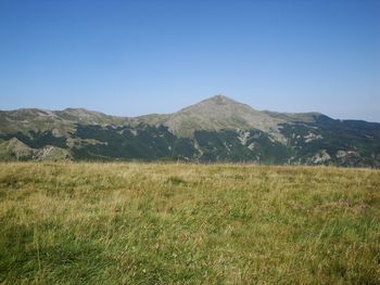 Scenic view of mountains against clear sky