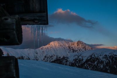 Scenic view of mountains against sky during winter