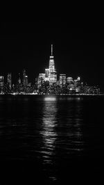 Illuminated buildings in city at night