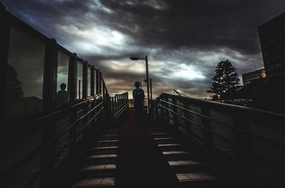 View of bridge against cloudy sky