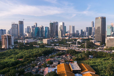 Aerial view of cityscape against sky