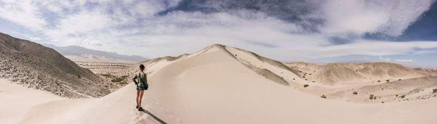 Panoramic view of arid landscape against sky