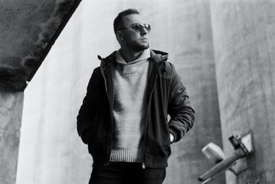 Young man smoking outdoors