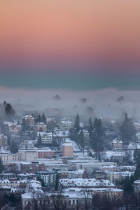 High angle view of townscape against sky during sunset
