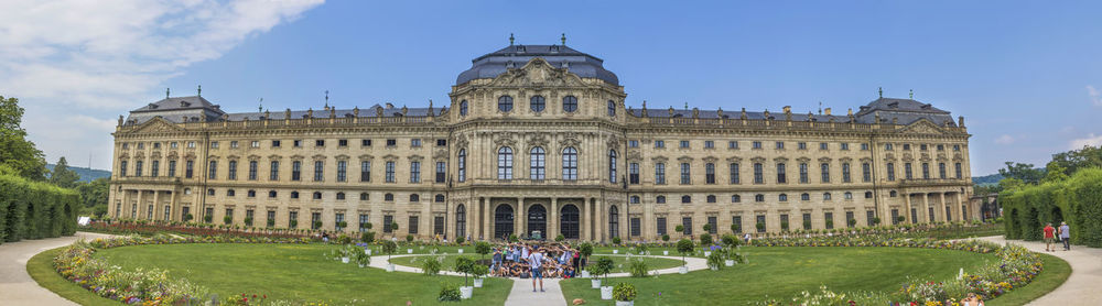 Group of people in front of historical building