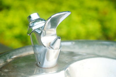 Close-up of water on glass table