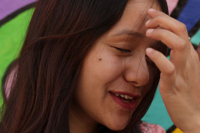 Close-up portrait of woman smiling