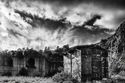 Old building against cloudy sky