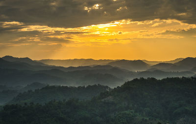 Scenic view of mountains against sky during sunset