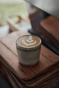 High angle view of coffee cup on table