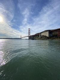 View of suspension bridge over sea