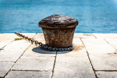 Close-up of retaining wall against sea