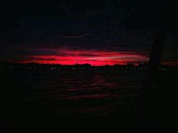 Scenic view of sea against sky at night