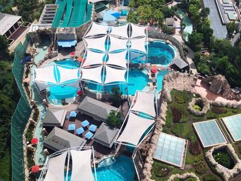 High angle view of swimming pool in city