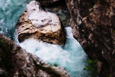 Close-up of water flowing through rocks