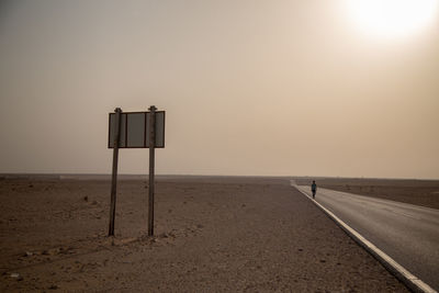 Scenic view of desert against sky during sunset