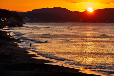 Scenic view of sea against sky during sunset