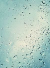 Close-up of wet window during rainy season