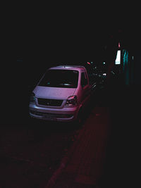 Car on road at night