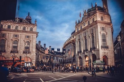 People at piccadilly circus during sunset