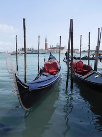 Boats moored in canal