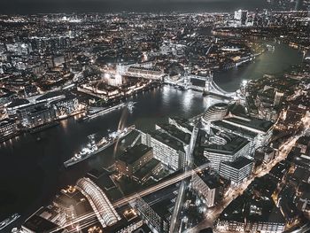 High angle view of illuminated buildings in city