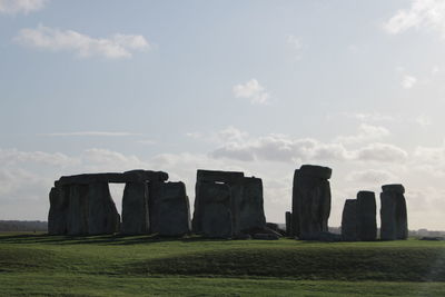 Built structure on landscape against sky