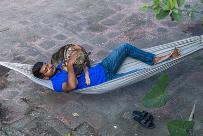 High angle view of woman sitting in boat