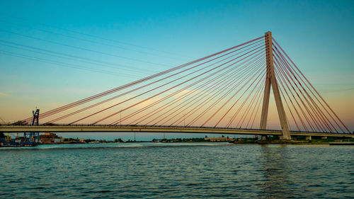 View of suspension bridge over river