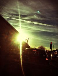 Cars on road against sky