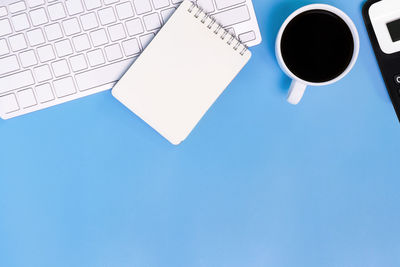 High angle view of coffee cup on table