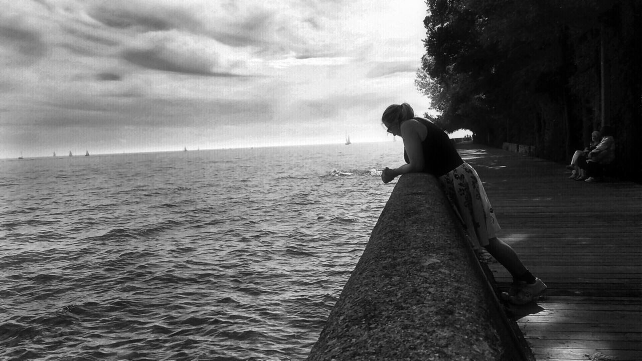 water, sky, sea, cloud - sky, tranquility, tranquil scene, horizon over water, cloud, nature, lifestyles, pier, beach, scenics, leisure activity, men, cloudy, beauty in nature, outdoors