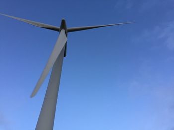 Low angle view of windmill