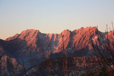 Scenic view of mountain against sky during sunset